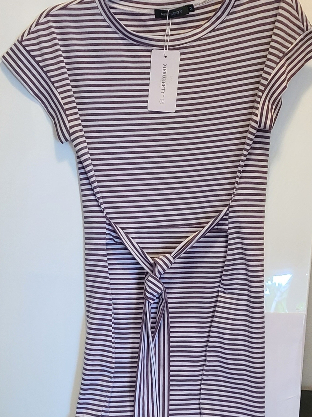 MEROKEETY striped t-shirt dress. Featuring a classic crew neck, short sleeve Tee